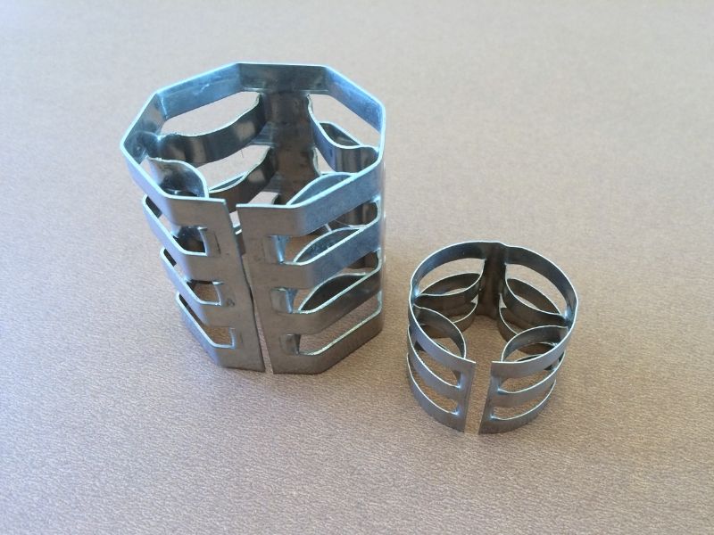 Metal VSP Ring Random Packing รูปทรงสมมาตรที่มี Porosity สูง สำหรับงานที่ต้องการ Pressure Drop ต่ำ